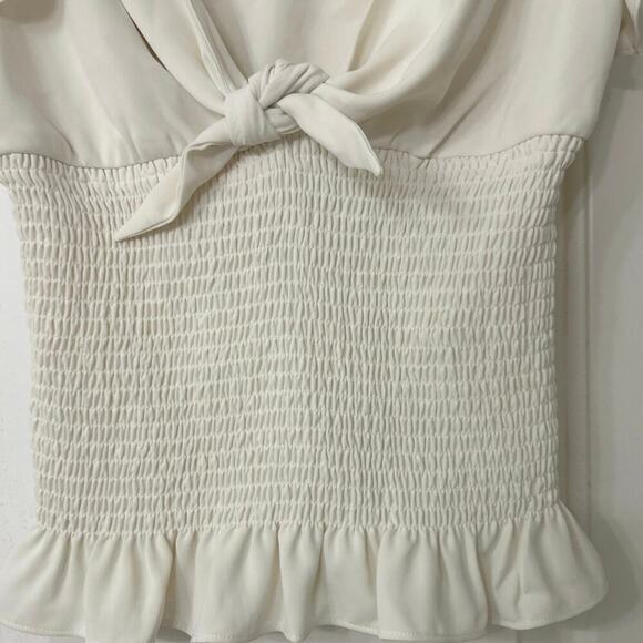 AMANDA UPRICHARD Ember Smocked Flutter Sleeve Sweetheart Neckline Top
Size Small - Picture 7 of 11